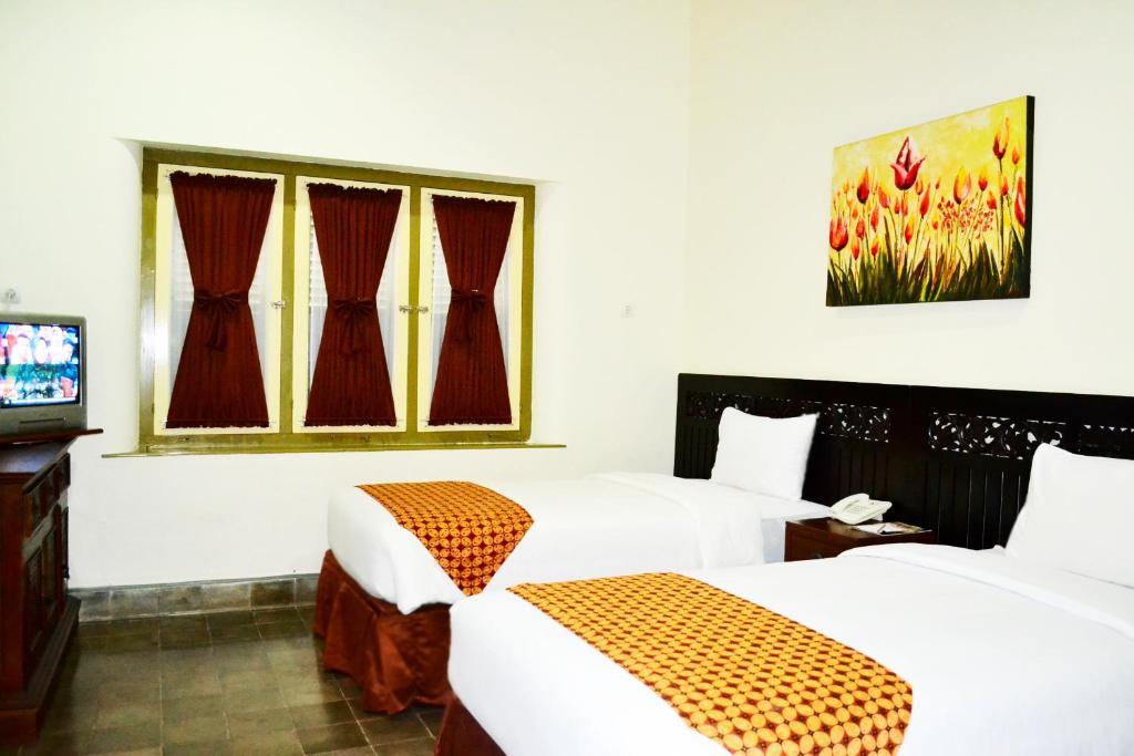 The Kresna Hotel Jogjacarta Quarto foto